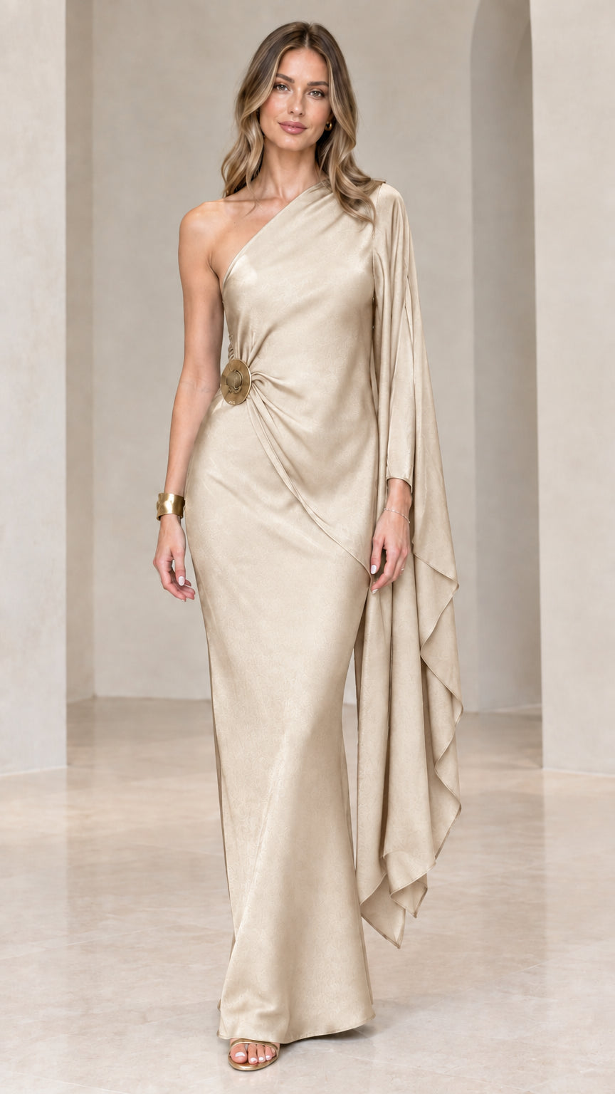 Champagne gold one-shoulder draped satin evening gown with cape sleeve