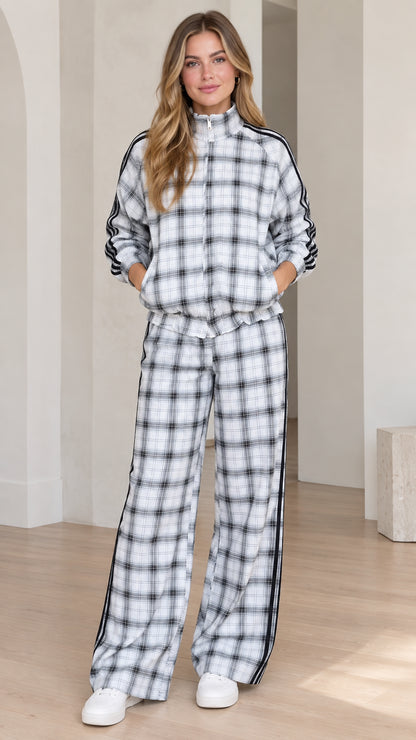 Women's white plaid zip jacket and wide leg pants tracksuit front view