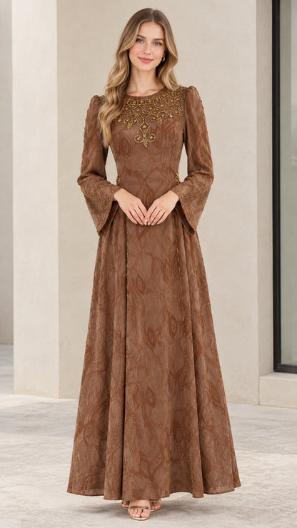 Front full-length view of woman wearing brown jacquard beaded maxi dress