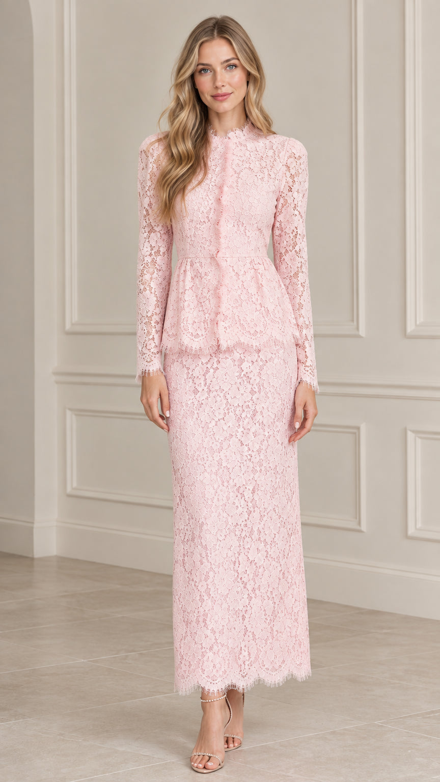 Front view of model wearing Blush Pink floral lace peplum long sleeve maxi dress