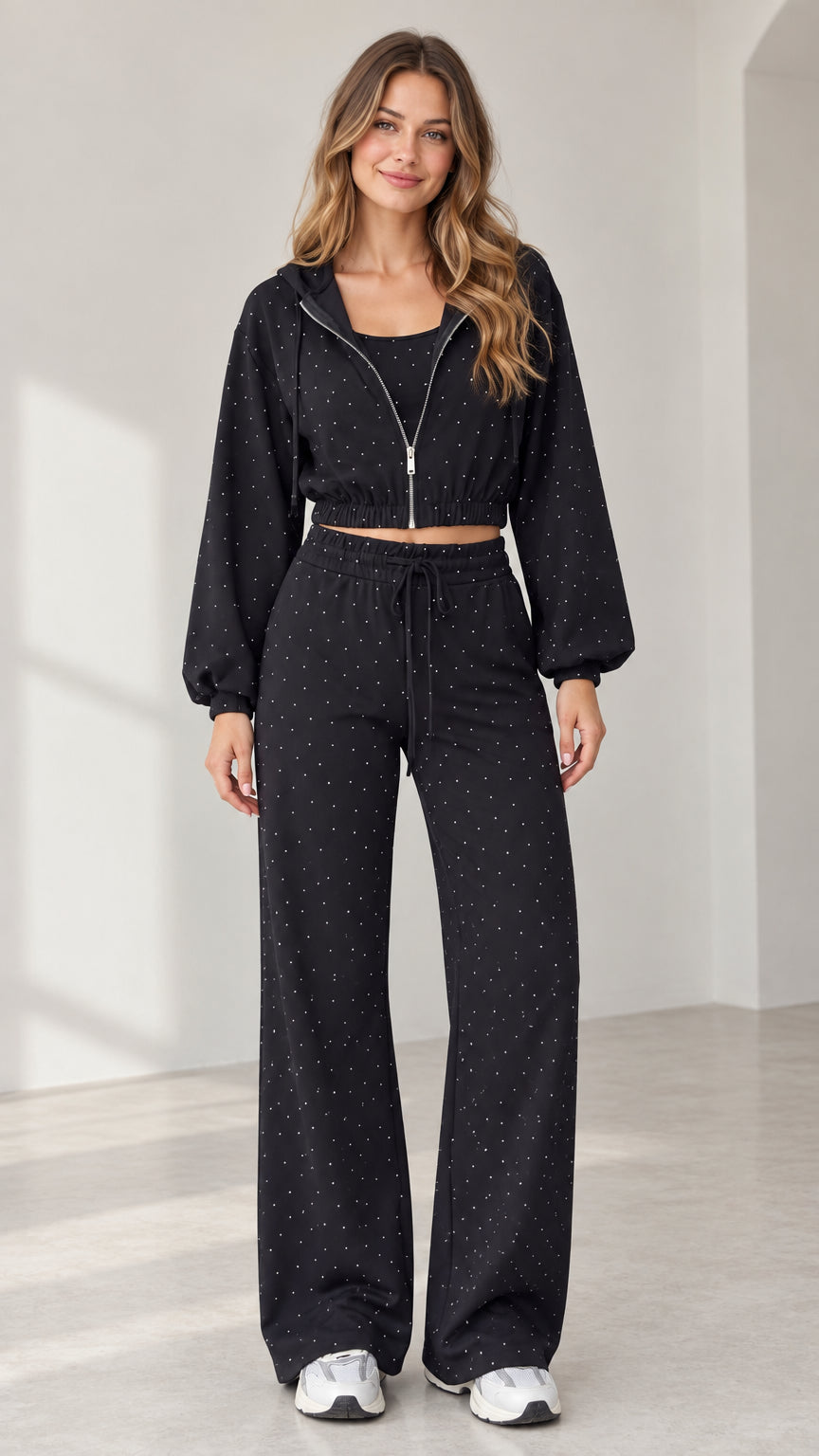 Full front view of model wearing black rhinestone cropped zip hoodie and wide-leg pants set