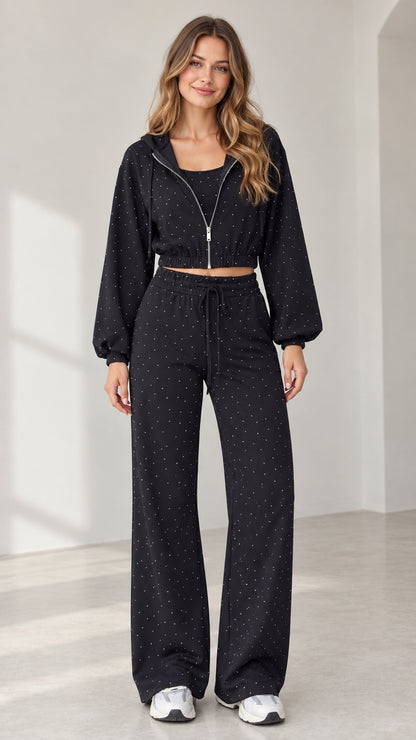 Full front view of model wearing black rhinestone cropped zip hoodie and wide-leg pants set
