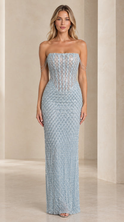 Front view of model wearing Ice Blue strapless beaded corset evening gown