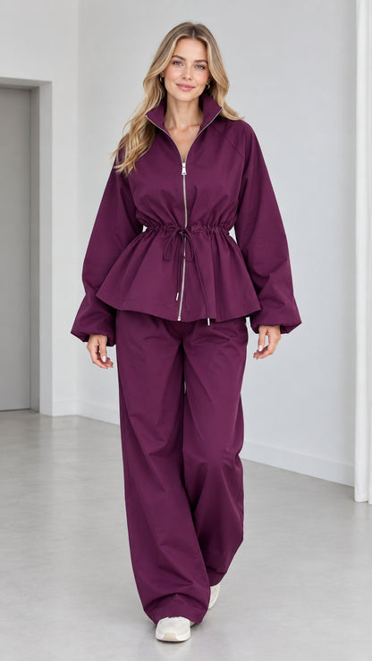 Women's plum purple drawstring peplum zip jacket and wide-leg pants two-piece set front view