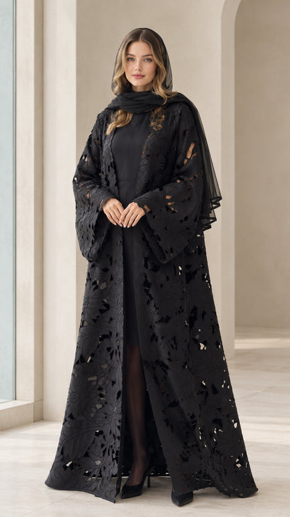 Full front view of model wearing black floral cutout open-front abaya set with matching scarf