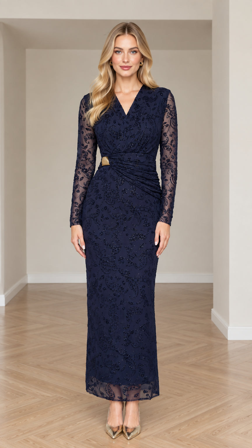 Front view of woman wearing navy blue long sleeve embellished lace maxi evening gown