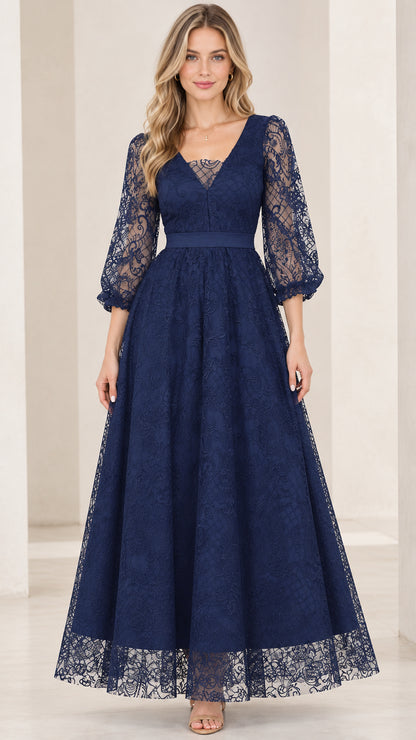 Front view of woman wearing navy blue floral lace maxi dress with 3/4 sleeves