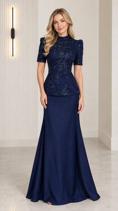 Front view of model wearing Navy Blue beaded mock neck peplum evening gown