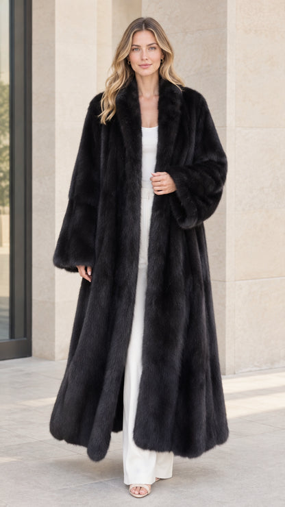 Front view of woman wearing long black plush faux fur maxi coat