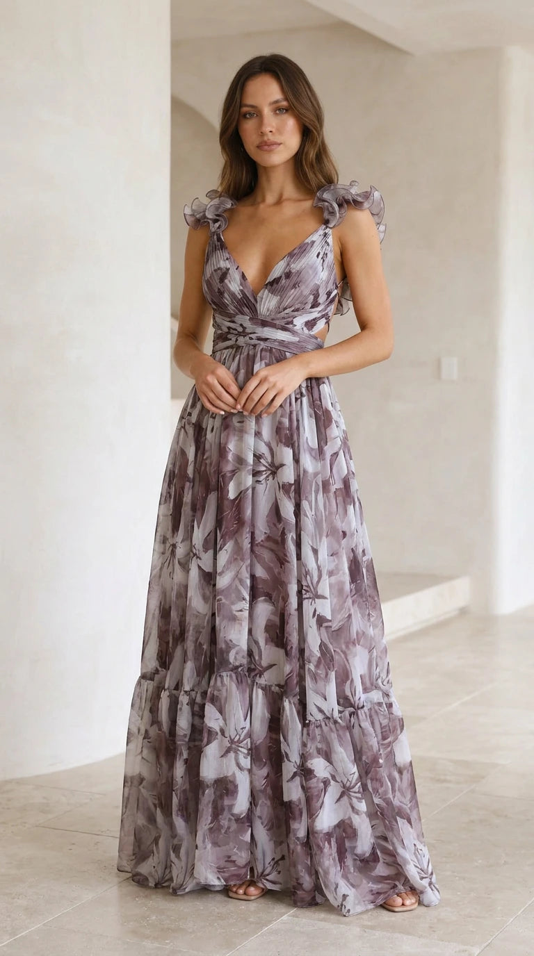 Front view of woman wearing dusty purple floral maxi dress with ruffle straps and tiered skirt