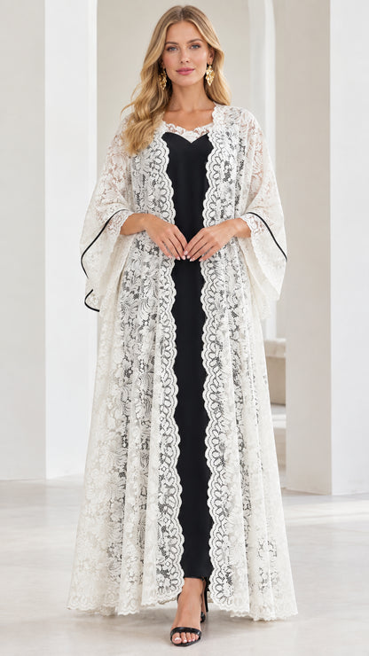Front full view of white floral lace duster cardigan over black maxi slip dress