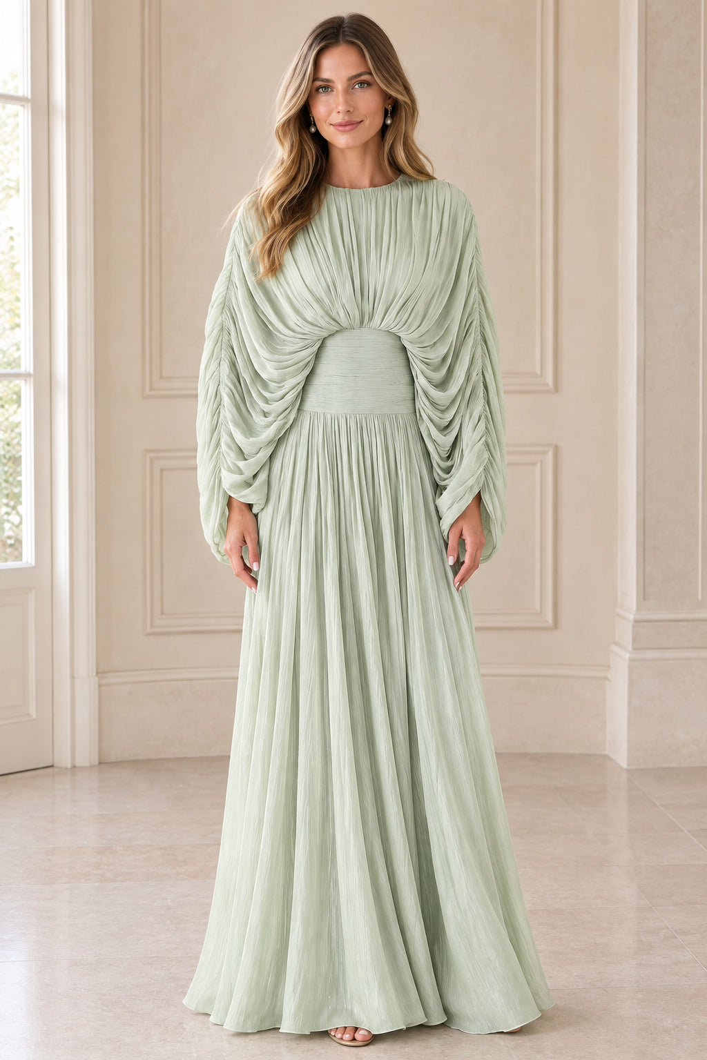 Front view of model wearing Sage Green pleated draped cape sleeve maxi dress