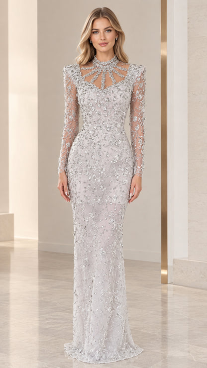 Front view of woman wearing silver embellished long sleeve high neck evening gown