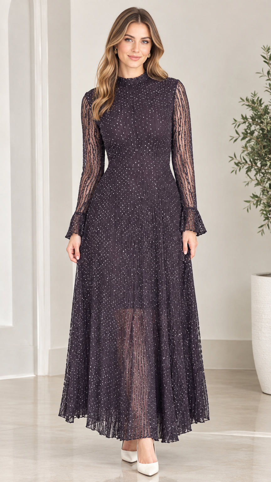 Front full-length view of woman wearing dark purple glitter pleated mock neck maxi dress
