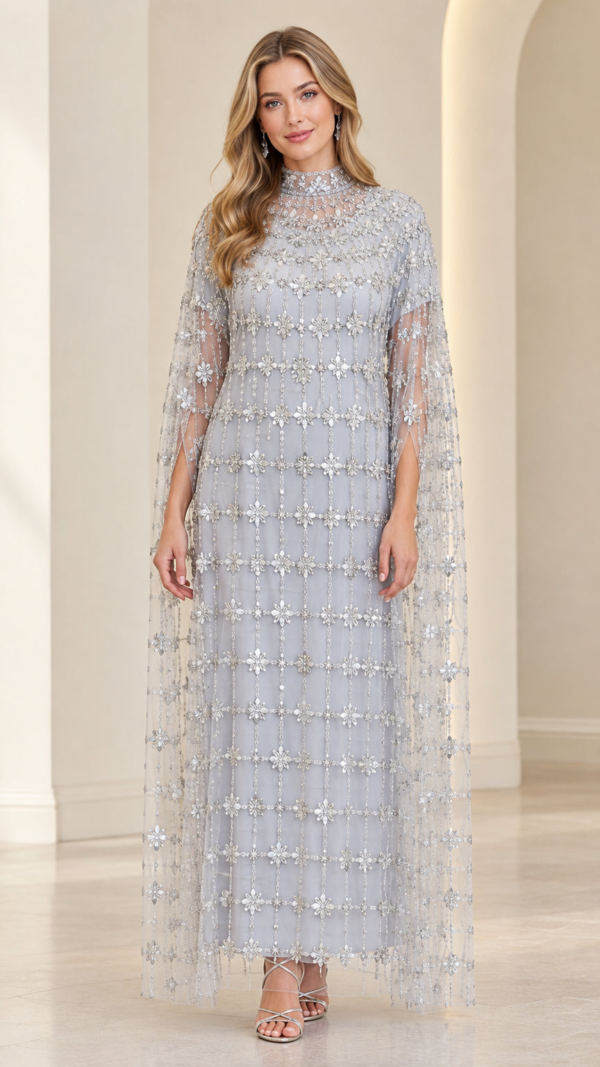 Front view of model wearing Ice Blue beaded high-neck evening gown with cape overlay