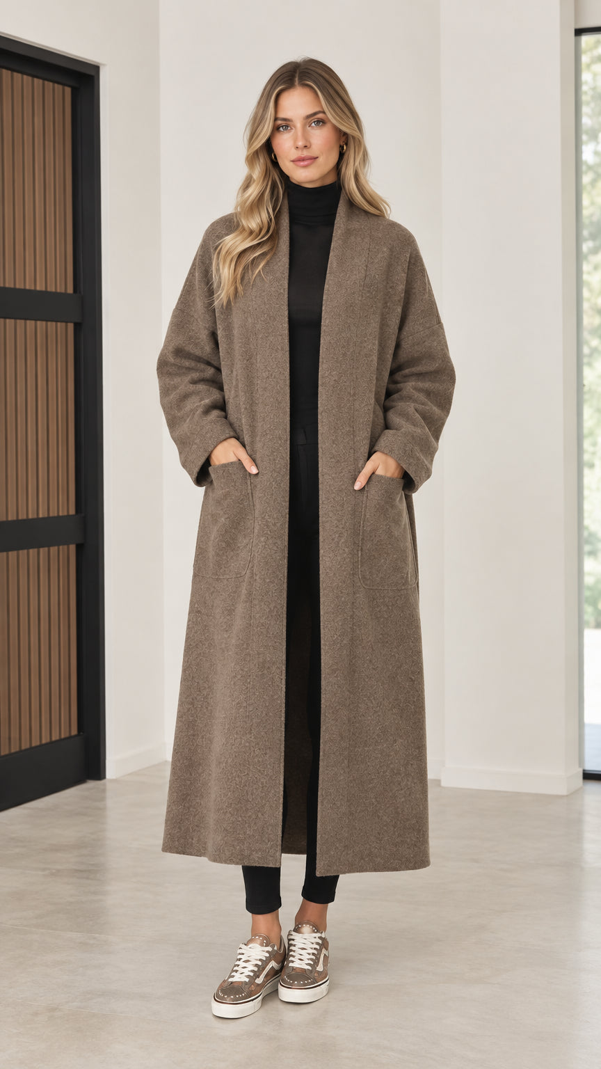Front view of model wearing mocha open front longline maxi coatigan