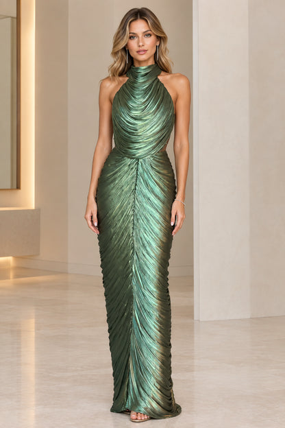 Front view of model wearing emerald green metallic pleated halter maxi evening gown