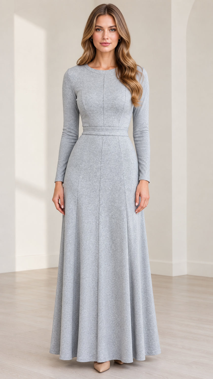 Front view of woman wearing Heather Grey long sleeve crew neck A-line maxi dress