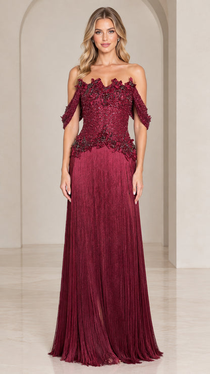 Front view of woman wearing burgundy off-the-shoulder beaded fringe evening maxi gown