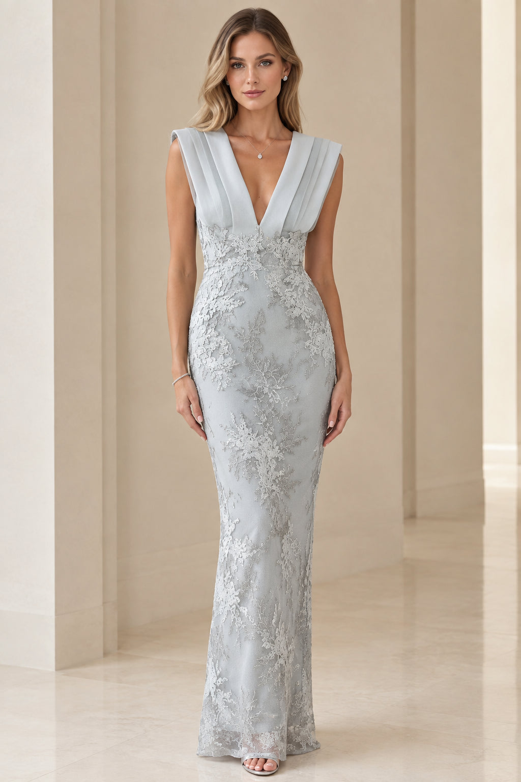 Front view of model wearing dusty blue pleated chiffon and corded lace evening maxi gown