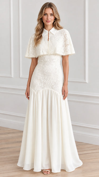 Front full view of woman wearing white collared lace capelet maxi dress