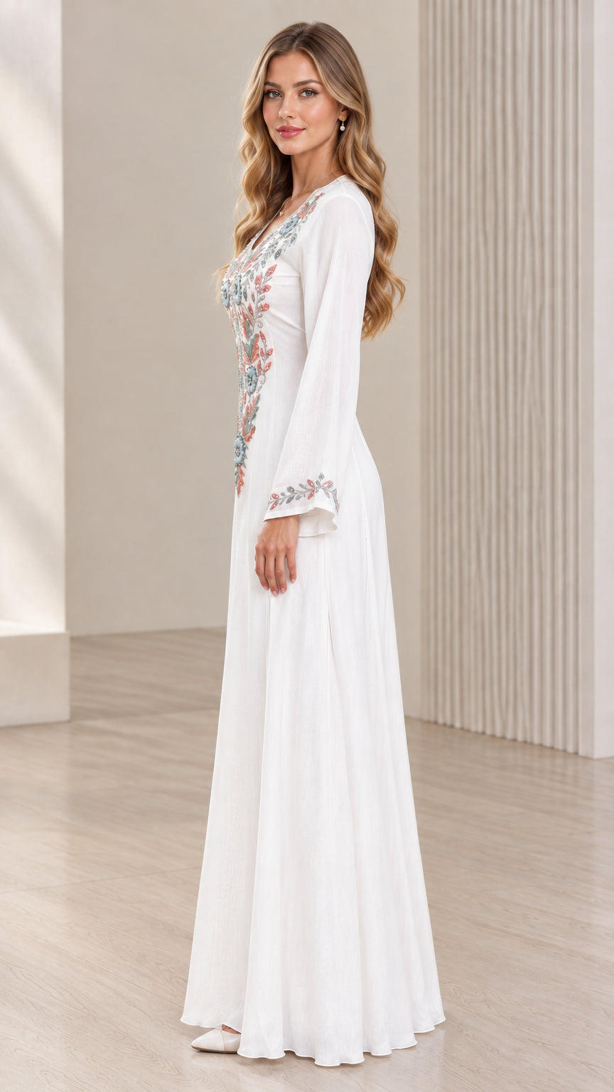 White embroidered maxi dress side view showing graceful drape