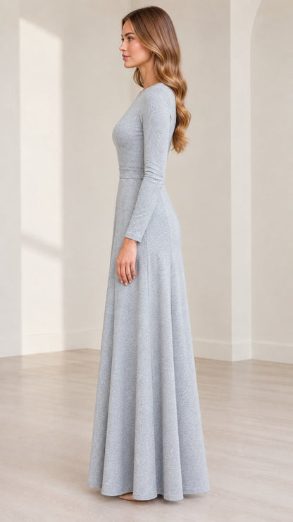 Side profile of woman wearing Heather Grey long sleeve flared maxi dress