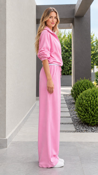 Side view of model in pink matching loungewear tracksuit set