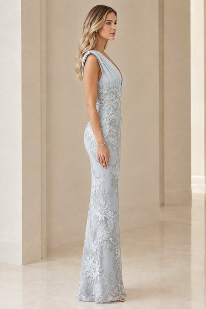 Side profile of model wearing dusty blue corded lace formal column gown