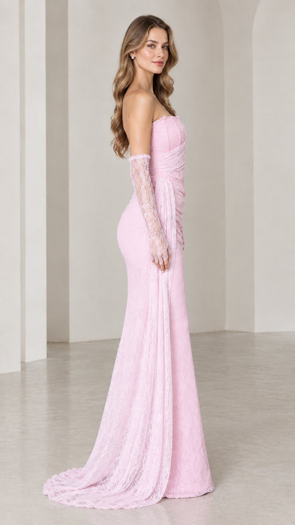Side profile view of elegant pink lace mermaid gown with sweeping floor-length hem