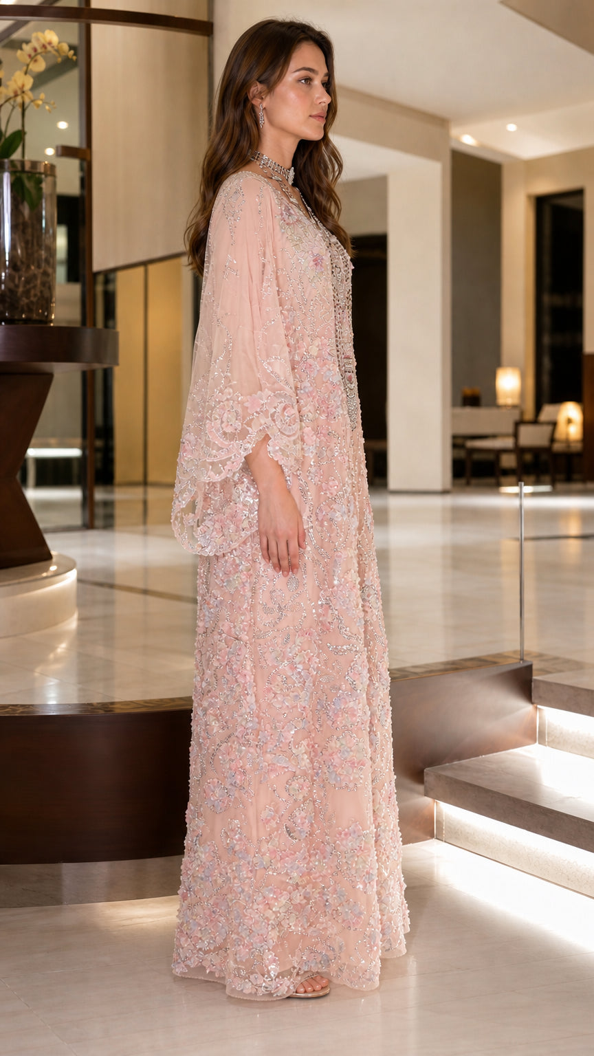 Side angle of blush pink floral sequin kaftan maxi dress with wide sleeves