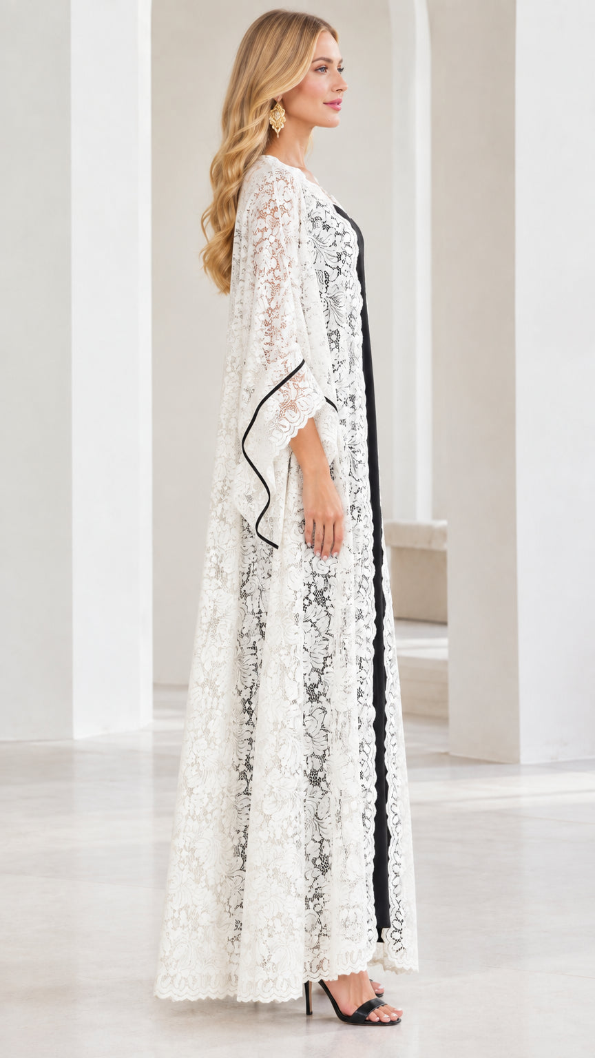 Side profile of white floral lace kimono coat and long evening dress