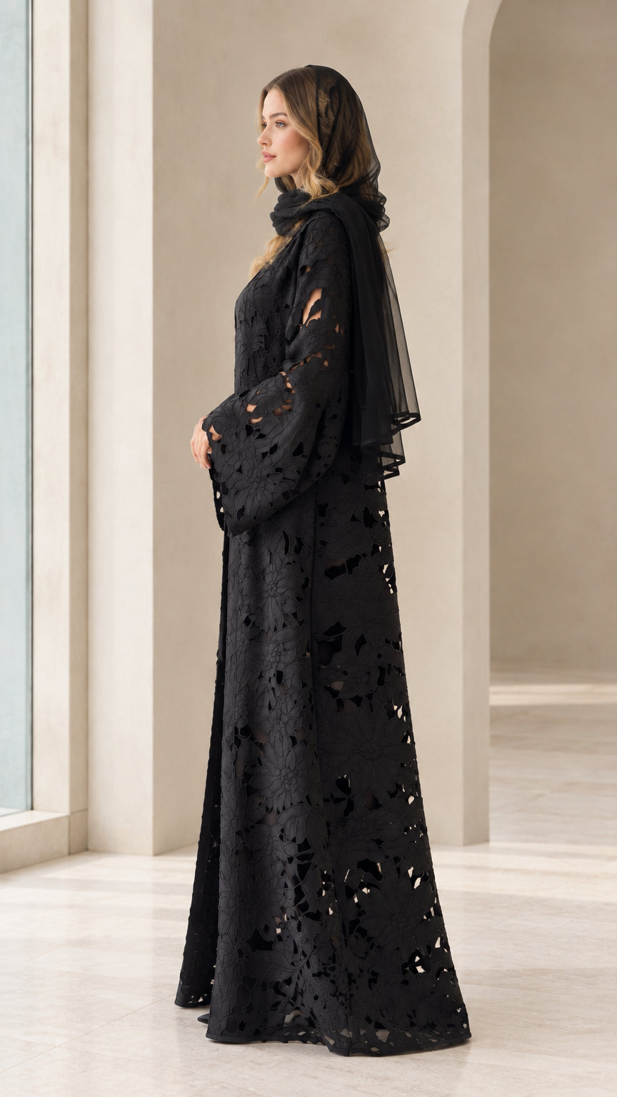 Side angle view of black floral lace maxi abaya robe and inner dress
