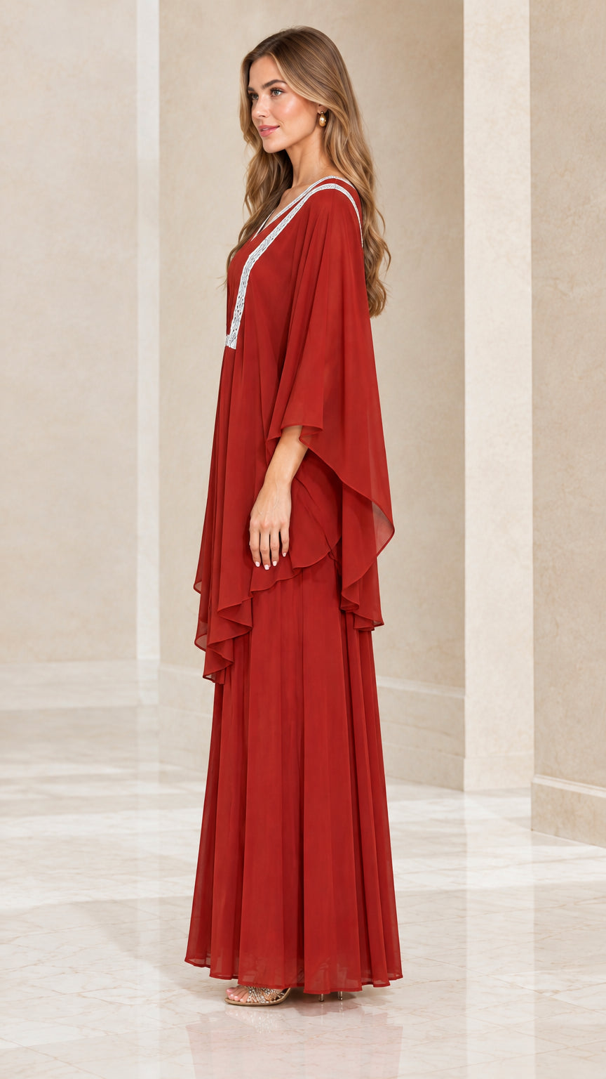 Side profile view of rust red flowing chiffon layered kaftan maxi dress