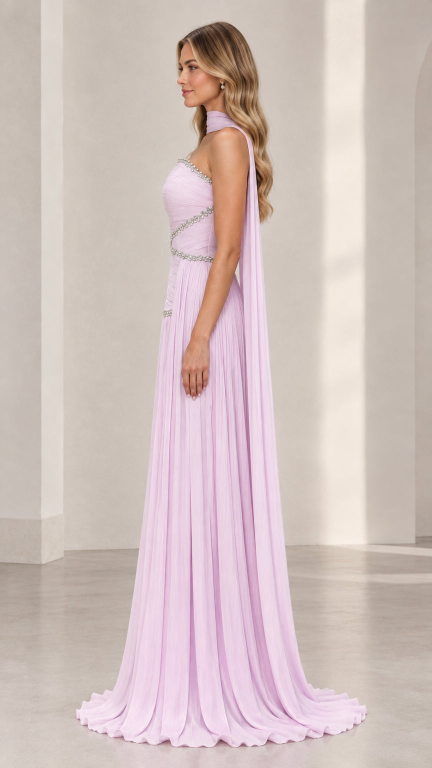 Side angle of lavender strapless evening gown showing flowing silhouette and cape detail
