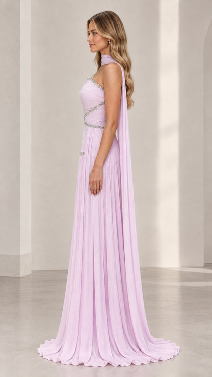 Side angle of lavender strapless evening gown showing flowing silhouette and cape detail