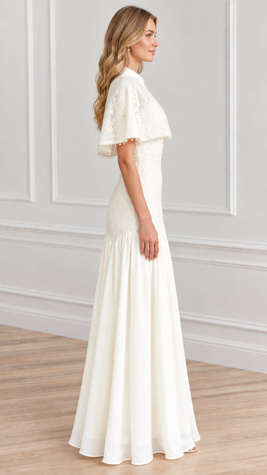 Side profile view of woman wearing white lace capelet formal gown