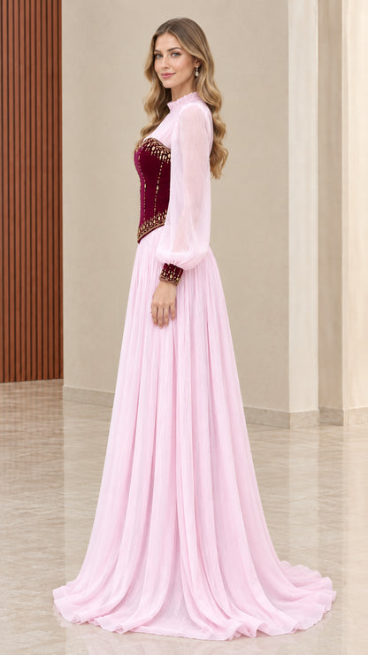 Side angle of model in romantic pink and burgundy corset evening gown