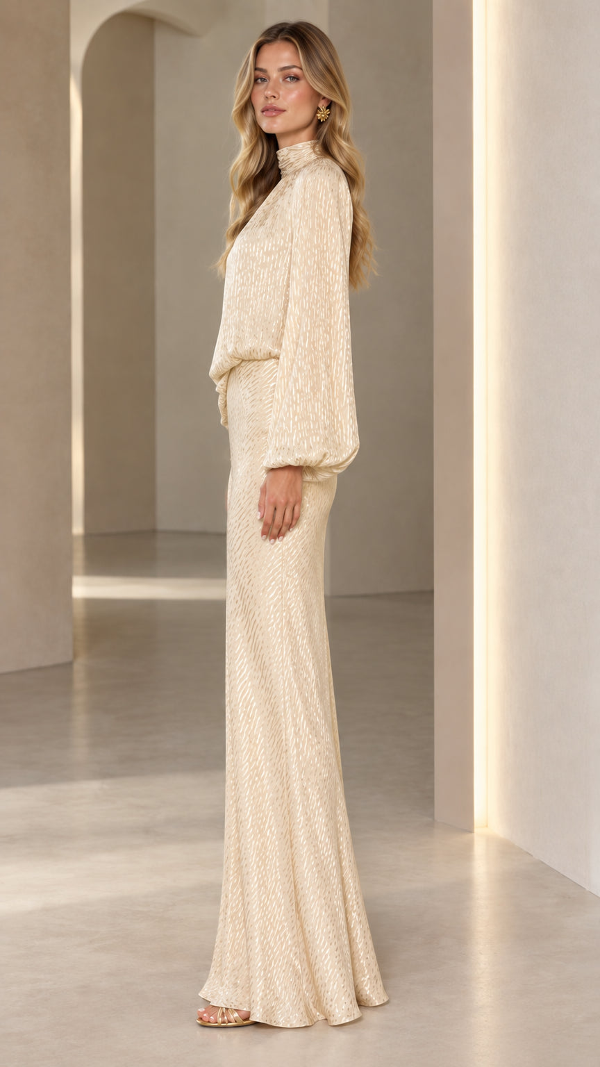 Side profile view of Champagne high neck lantern sleeve evening gown