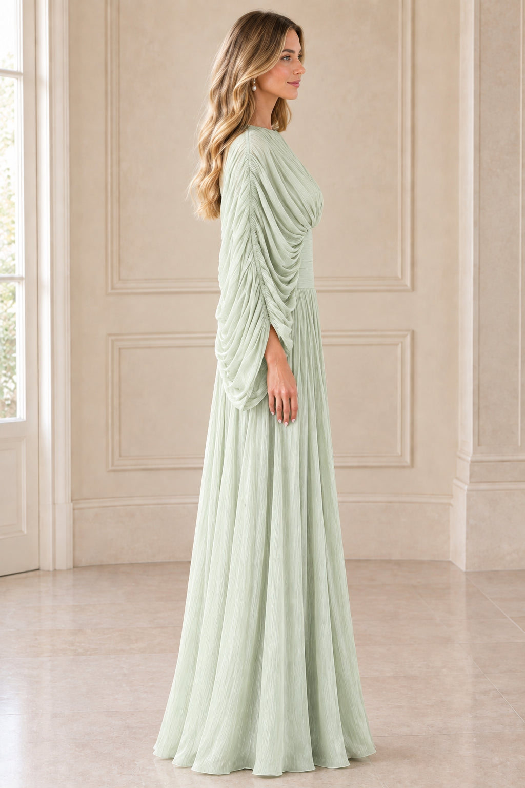 Side profile view of Sage Green pleated floor-length evening dress with draped sleeves