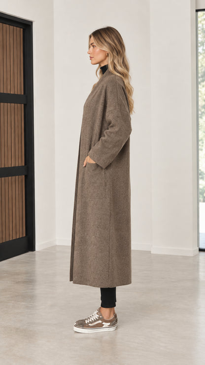 Side profile of model wearing mocha maxi duster coatigan