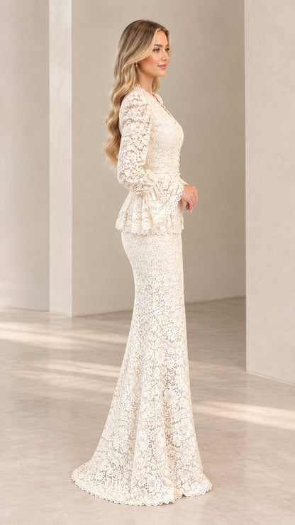 Side profile of elegant ivory lace evening gown showcasing peplum waist and mermaid flare