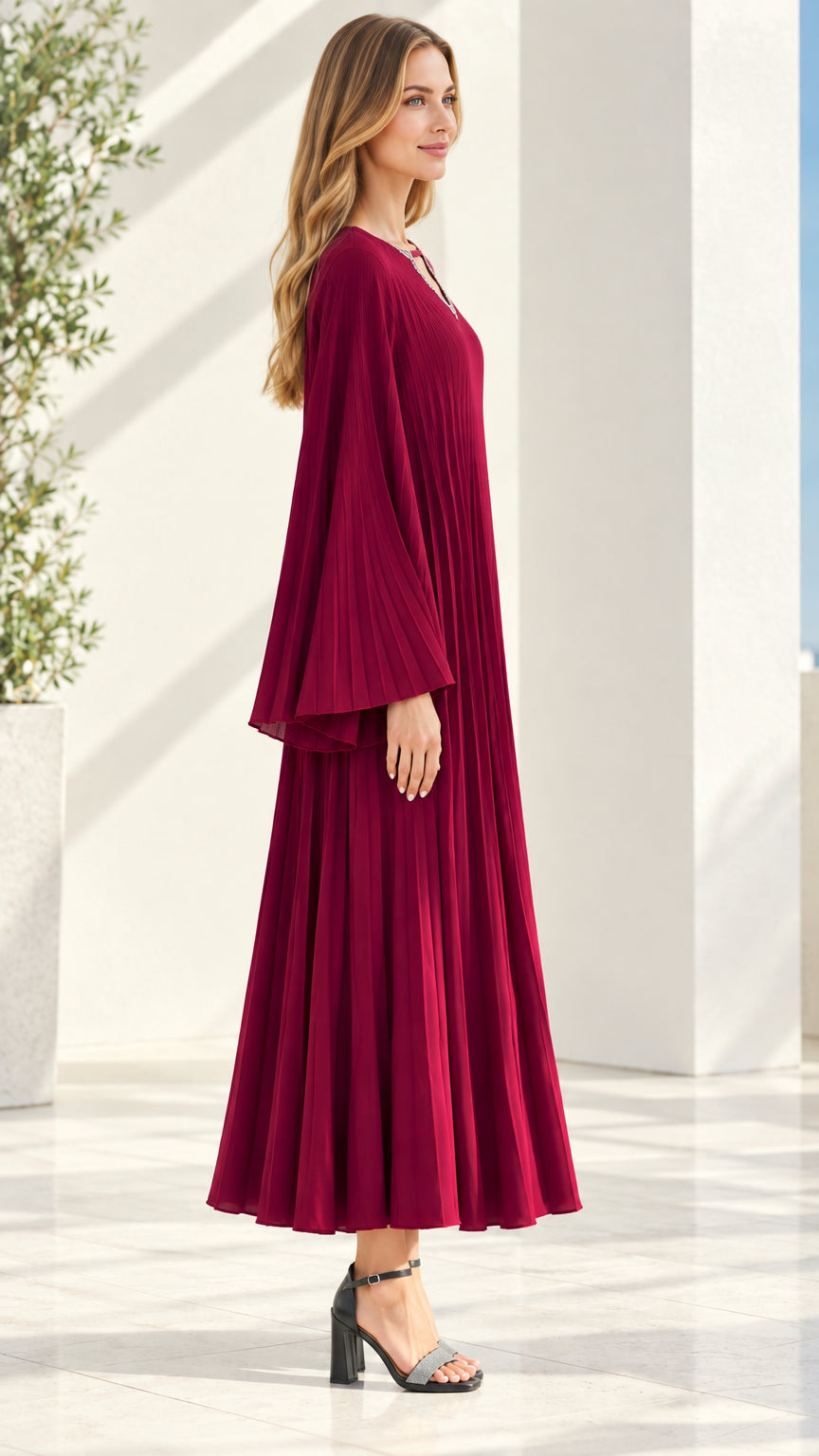 Side profile view of burgundy pleated bell sleeve maxi evening dress