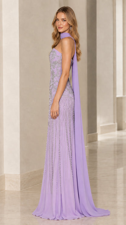 Side profile view of lavender beaded formal gown showing elegant silhouette and cape drape