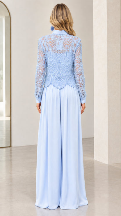 Back view of light blue lace long sleeve jumpsuit with wide palazzo pants