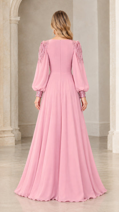 Back view of model showcasing pink chiffon maxi dress with back zipper