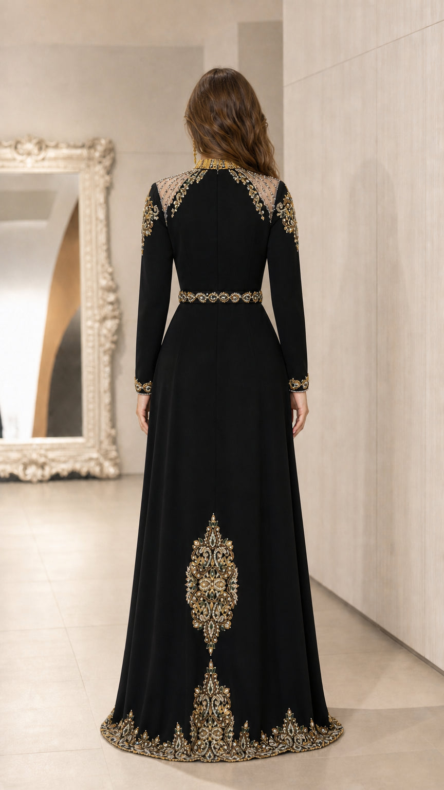 Back view of black long sleeve evening dress with gold embroidery