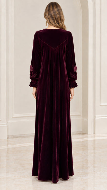 Back view of burgundy velvet relaxed-fit maxi dress