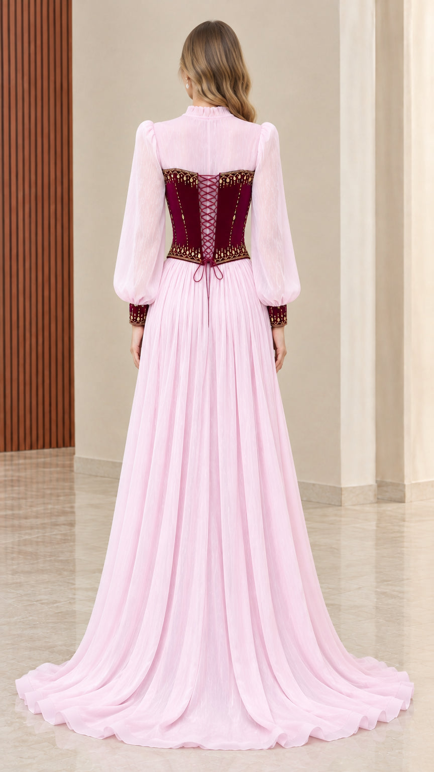 Back view of pink chiffon gown showing adjustable lace-up velvet corset back