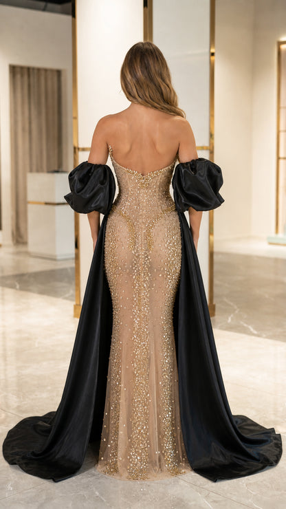 Champagne gold beaded mermaid gown showing open back and black train